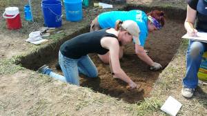Me and undergraduate student Eden excavating a unit at Hanna's Town.